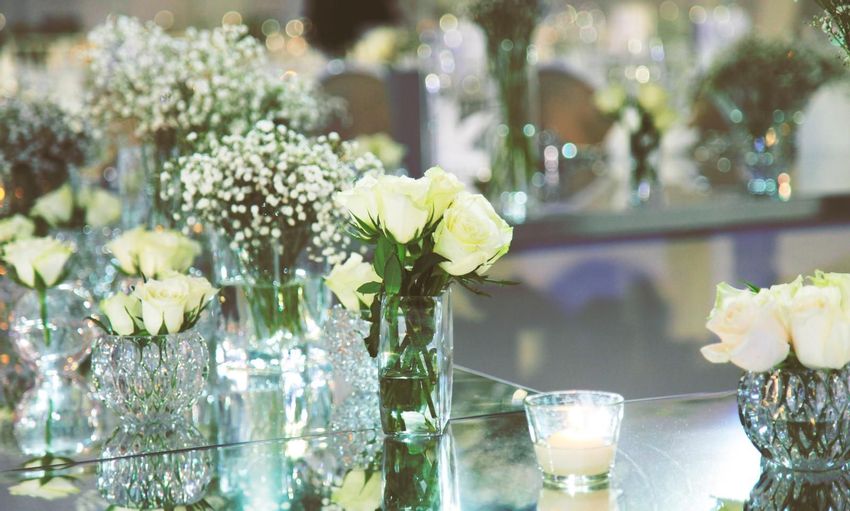 Mini floral arrangement in crystal vases