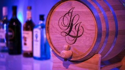Monogrammed wine barrels for the couple