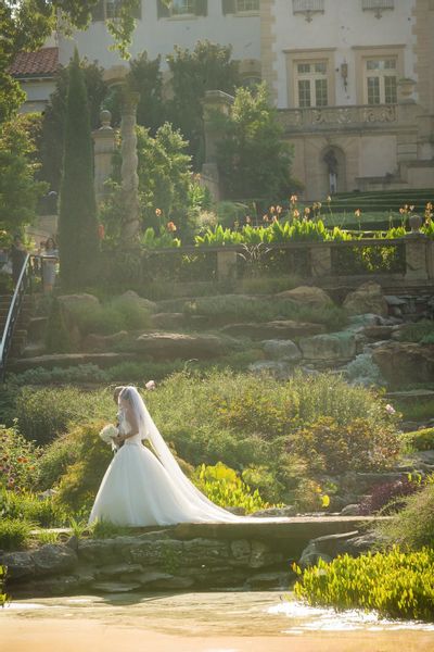 The couple stroll in the garden at the Philbrook Museum of Art in Oklahoma