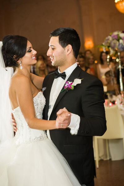 The couple share their first dance at The Mayo Hotel reception hall 