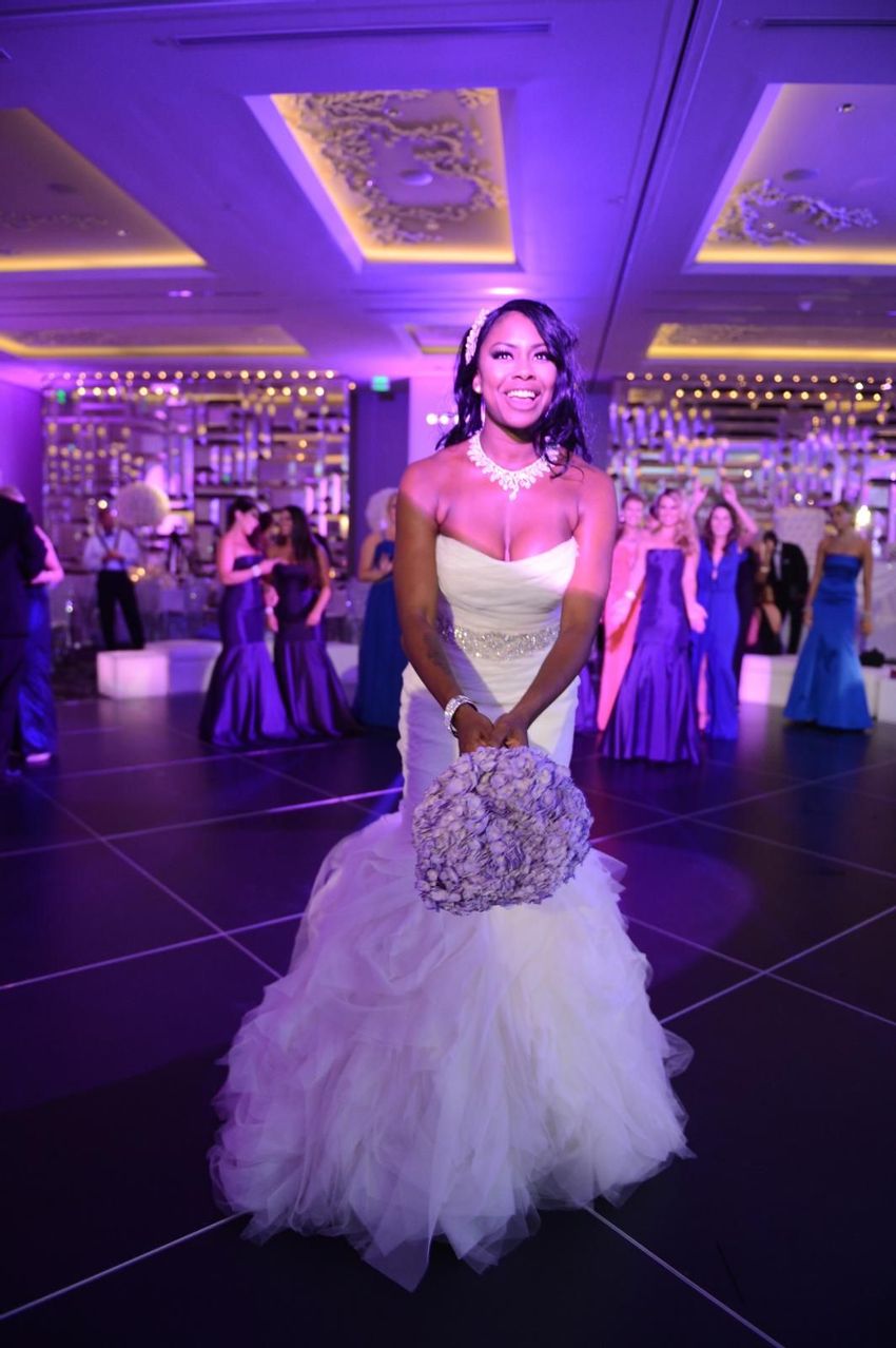 Bride tossing her wedding bouquet