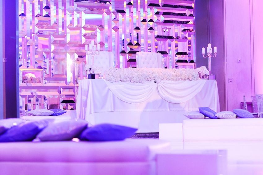 Sweetheart table with mirror backdrop