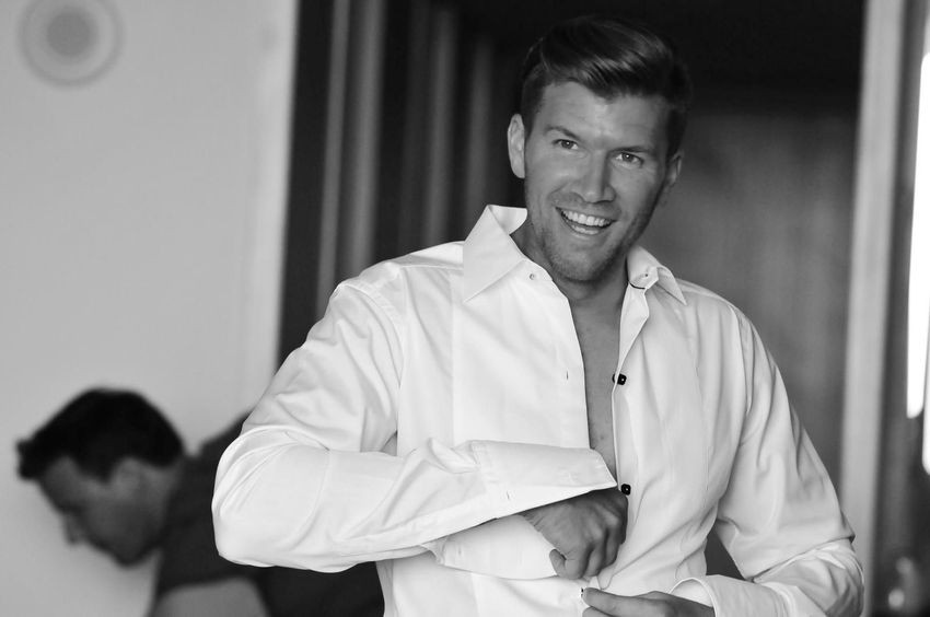 The groom is getting ready for his ceremony 