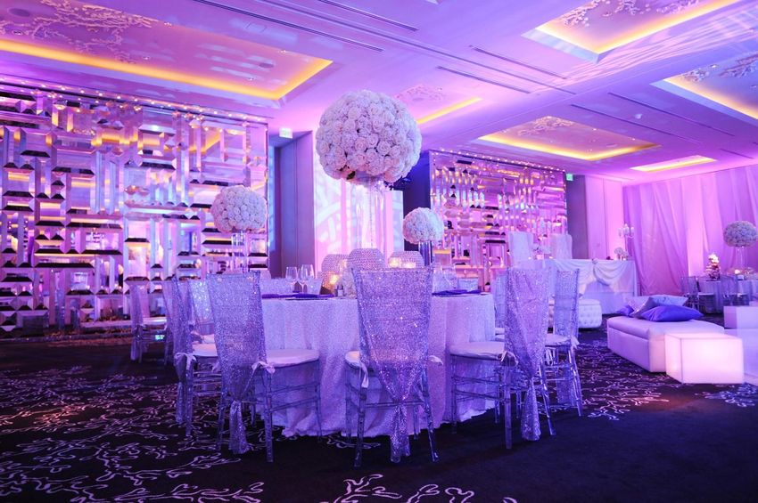 Round dinner tables and ghost chiavari chairs at St. Regis Resort, Bal Harbour