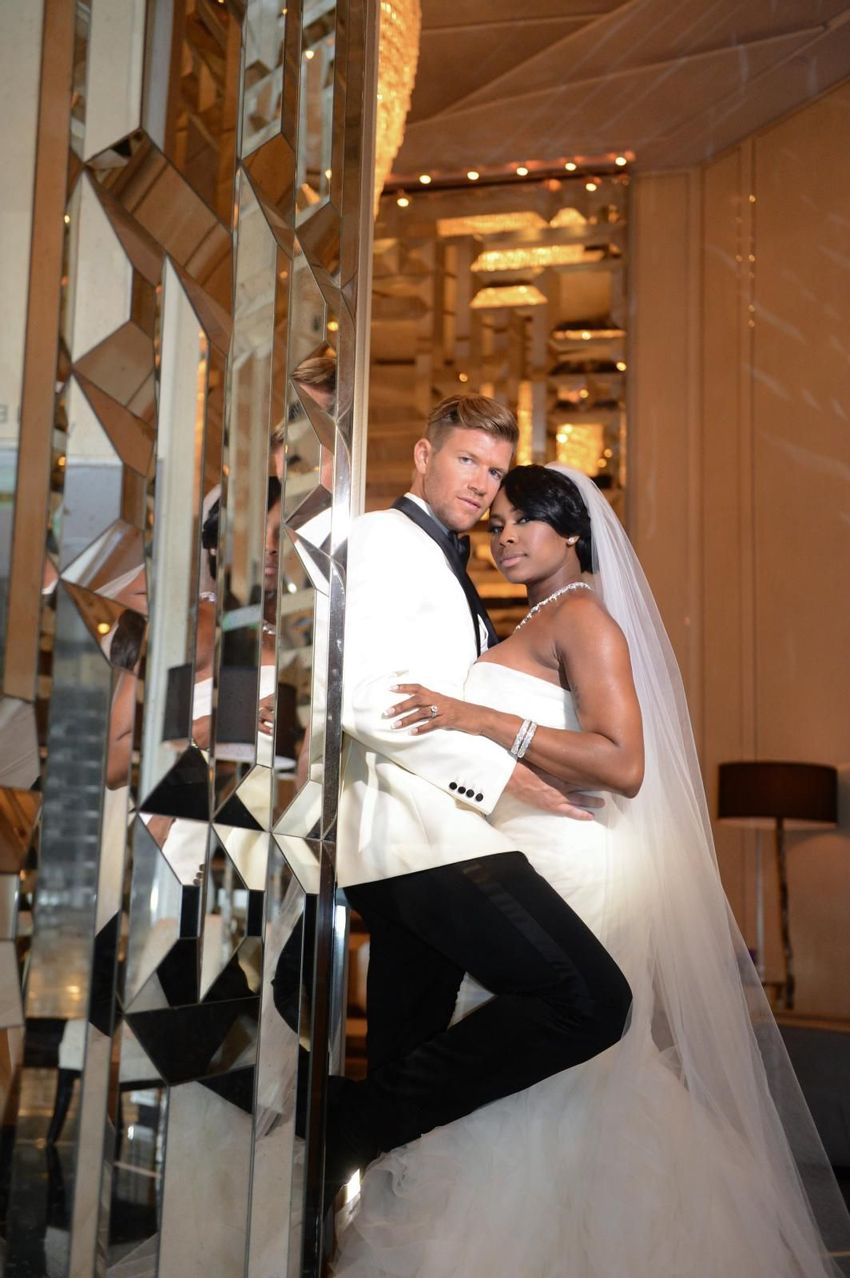 Couple's pose at The St. Regis Resort, Bal Harbour